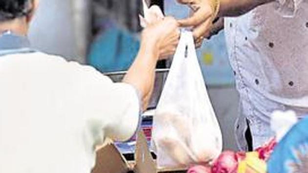 Paper bags and cloth bags have replaced plastic carry bags in most stores, but they do not provide relief from monsoon damage.(HT File Photo)