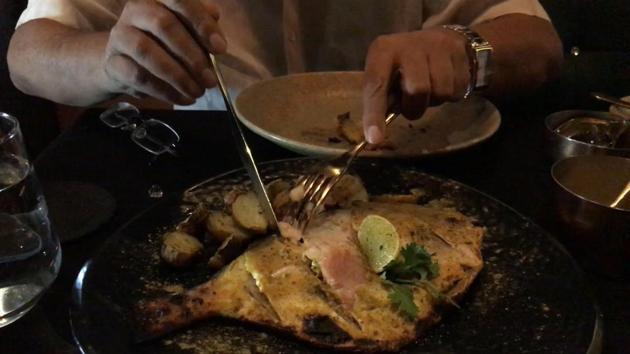 The grilled pomfret at at Karma Kismet comes with white butter sauce.(HT file) The grilled pomfret at at Karma Kismet comes with white butter sauce.(HT file)
