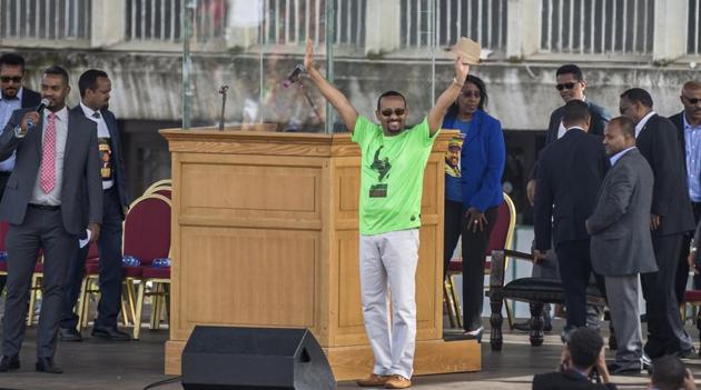 Ethiopia's Prime Minister Abiy Ahmed waves to the crowd at a large rally in his support, in Meskel Square in the capital, Addis Ababa, Ethiopia Saturday, June 23, 2018. (AP) Ethiopia's Prime Minister Abiy Ahmed waves to the crowd at a large rally in his support, in Meskel Square in the capital, Addis Ababa, Ethiopia Saturday, June 23, 2018. (AP)