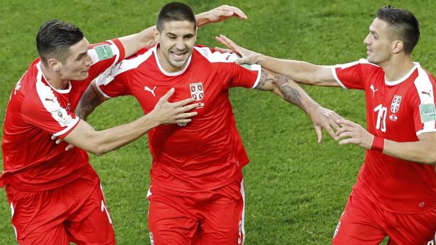 Serbia's Aleksandar Mitrovic, centre, celebrates with teammates after scoring the equaliser. (AP) Serbia's Aleksandar Mitrovic, centre, celebrates with teammates after scoring the equaliser. (AP)