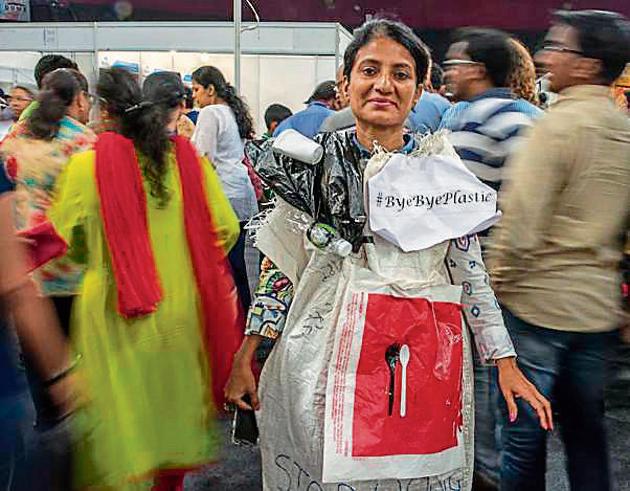 A woman at the exhibition chooses an unusual method to spread the word against plastic. (Satish Bate/HT Photo) A woman at the exhibition chooses an unusual method to spread the word against plastic. (Satish Bate/HT Photo)