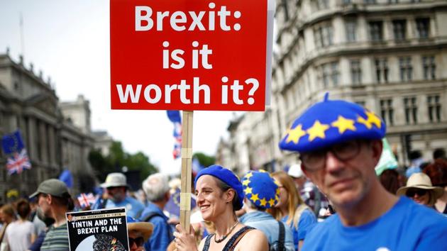 A woman holds a placard as she joins EU supporters, calling on the government to give Britons a vote on the final Brexit deal, participating in the 'People's Vote' march in central London, Britain on June 23. (REUTERS) A woman holds a placard as she joins EU supporters, calling on the government to give Britons a vote on the final Brexit deal, participating in the 'People's Vote' march in central London, Britain on June 23. (REUTERS)
