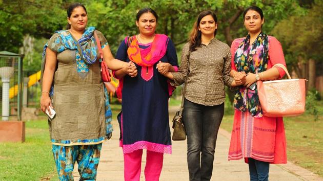 Deserted by their NRI husbands (from left) Reena Chauhan, Amrit Pal Kaur, Ritu Sharma and Rupali Gupta are putting up a joint fight under the banner of Together We Can, in Chandigarh. Their initiative led to the Regional Passport Office to suspend the passport of the runaway grooms.(Ravi Kumar/HT)