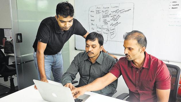 (From left) Sachin Bharadwaj, co­founder and CEO of Sminq India; Santhosh N, co­founder and COO, Sminq India; and Sheldon Dsouza, cofounder and chief architect of Sminq India, at their office in Kalyaninagar.(Shankar Narayan/HT PHOTO)