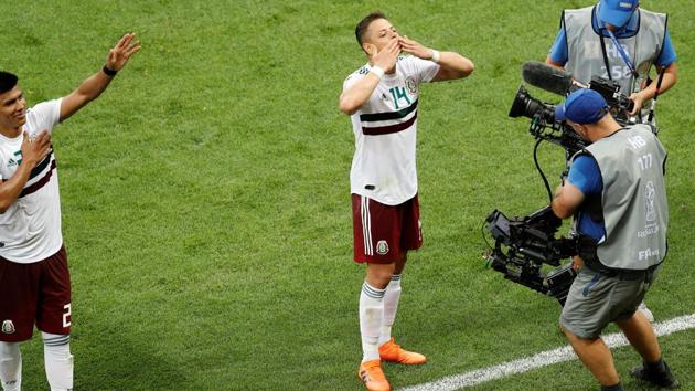 Mexico's Javier Hernandez celebrates victory after the match. (REUTERS)
