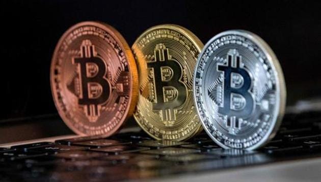 A visual representation of the digital cryptocurrency Bitcoin, in Tel Aviv. (AFP File Photo) A visual representation of the digital cryptocurrency Bitcoin, in Tel Aviv. (AFP File Photo)