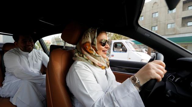 Samira al-Ghamdi, a practicing psychologist drives to work with her son Abdulmalik, 26, in Jeddah, Saudi Arabia. Saudi women steered their cars through busy streets for the first time on Sunday after the world’s last remaining ban on women driving was lifted. (Zohra Bensemra / REUTERS) Samira al-Ghamdi, a practicing psychologist drives to work with her son Abdulmalik, 26, in Jeddah, Saudi Arabia. Saudi women steered their cars through busy streets for the first time on Sunday after the world’s last remaining ban on women driving was lifted. (Zohra Bensemra / REUTERS)