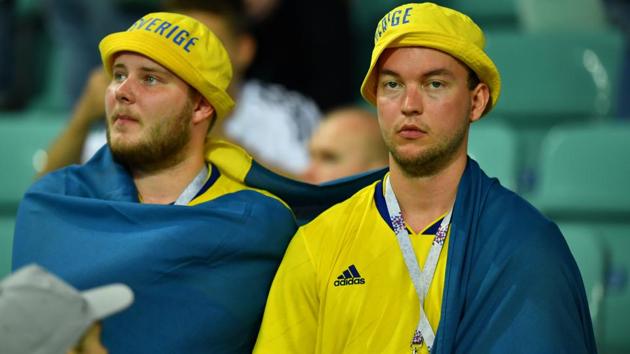 Sweden fans look dejected after the match. (REUTERS)