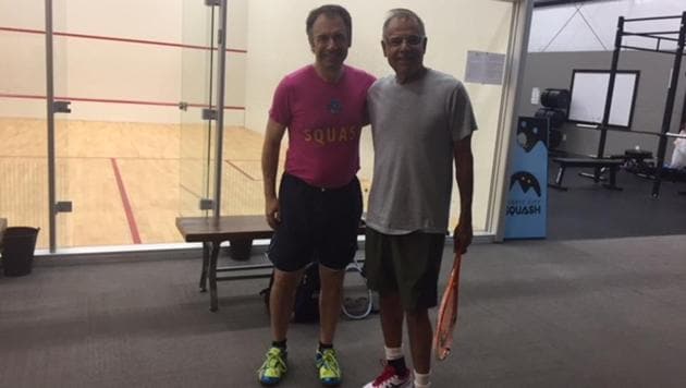 Anil Nayar with squash pro Richard Millman.