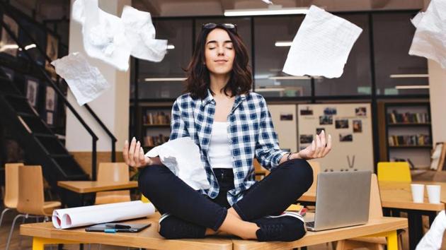 Just 15 minutes of quiet reflection, whether through meditation or even looking out the window will help you take a step towards achieving mental wellness and relaxation.(Shutterstock)