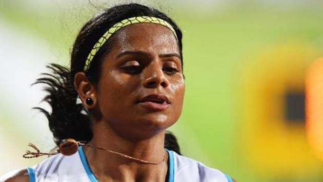 The coach of sprinter Dutee Chand has criticised the organisers’ decision to run the women’s 200m ahead of the shorter sprint. (AFP) The coach of sprinter Dutee Chand has criticised the organisers’ decision to run the women’s 200m ahead of the shorter sprint. (AFP)