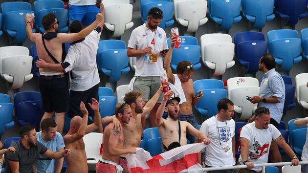 England fans celebrate their team’s 6-1 win over Panama. (AFP)