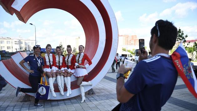 A Japan fan poses outside the Ekaterinburg Arena. (AFP)