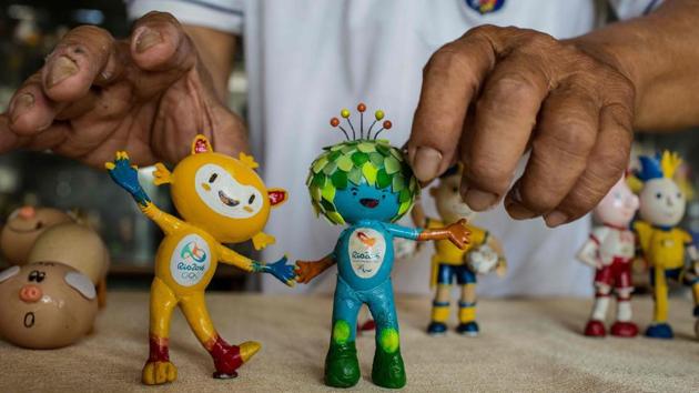 Now he has about 1,000 of the small figurines scattered throughout his apartment, some commemorating the 2016 Rio Olympics and Euro 2016 in France. Tam doesn’t sell the delicate dolls, preferring instead to keep them on display to wow his visitors. (Thanh Nguyen / AFP) Now he has about 1,000 of the small figurines scattered throughout his apartment, some commemorating the 2016 Rio Olympics and Euro 2016 in France. Tam doesn’t sell the delicate dolls, preferring instead to keep them on display to wow his visitors. (Thanh Nguyen / AFP)