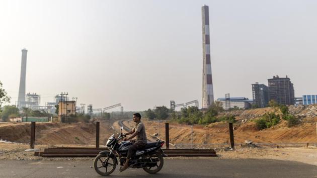 A motorist rides past the abandoned Matrishri Usha Jayaswal Thermal Power Plant. After taking haircuts of between 40-60% on their loans to troubled steel projects, the banks face a 75 % loss ratio on their power lending, according to the Bank of America Merrill Lynch estimate. (Prashanth Vishwanathan / Bloomberg) A motorist rides past the abandoned Matrishri Usha Jayaswal Thermal Power Plant. After taking haircuts of between 40-60% on their loans to troubled steel projects, the banks face a 75 % loss ratio on their power lending, according to the Bank of America Merrill Lynch estimate. (Prashanth Vishwanathan / Bloomberg)