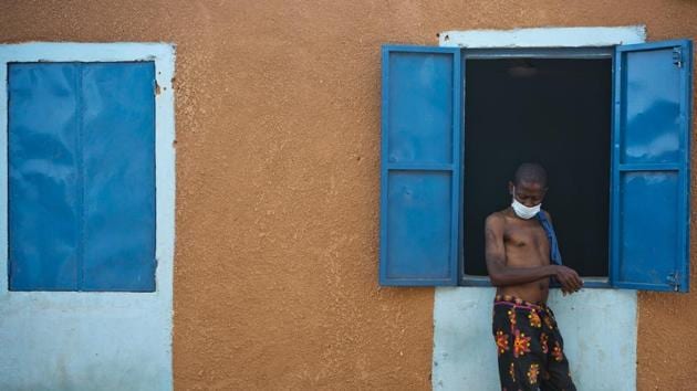 Isaac Solomon, 40, from Nigeria, waits for medical attention at the IOM transit center in Arlit. Algeria has denied criticism from the IOM and other organizations that it is committing human rights abuses by abandoning migrants in the desert, calling the allegations a “malicious campaign” intended to inflame neighbouring countries. (Jerome Delay / AP)