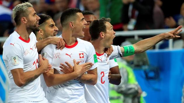 Switzerland's Granit Xhaka (centre) celebrates scoring against Serbia at the FIFA World Cup 2018.(REUTERS)