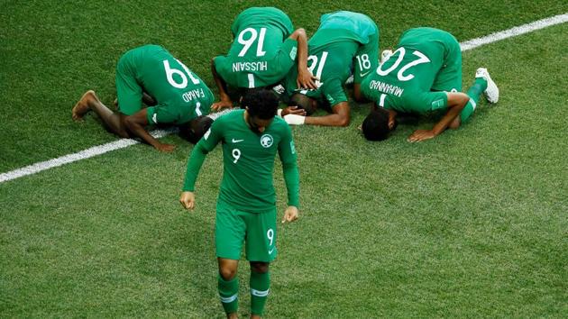 Saudi Arabia players celebrate after their FIFA World Cup Group A game against Egypt at the Volgograd Arena on Monday.(Reuters)