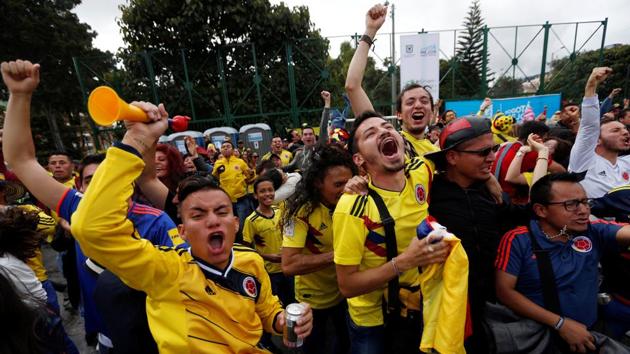 Colombian fans were all smiles after their team’s 3-0 win over Poland. (REUTERS)