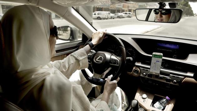 In this Sunday, June 24, 2018 photo, Ammal Farahat, who has signed up to be a driver for Careem, a regional ride-hailing service that is a competitor to Uber, drives her car in Riyadh, Saudi Arabia. (AP) In this Sunday, June 24, 2018 photo, Ammal Farahat, who has signed up to be a driver for Careem, a regional ride-hailing service that is a competitor to Uber, drives her car in Riyadh, Saudi Arabia. (AP)