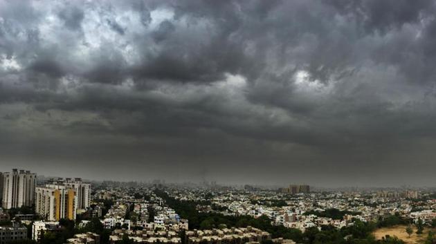 Black clouds hover over the city before monsoon’s arrival this week in Gurugram. Normal life was disrupted in Karnataka’s coastal districts after rains measuring upto 13 cm. Monsoon has entered Madhya Pradesh as well, covering Dhar, Alirajpur, Burhanpur, Barwani, Khargone, Jhabua and Khandwa districts, bringing down the mercury by a few notches. (Parveen Kumar / HT Photo) 