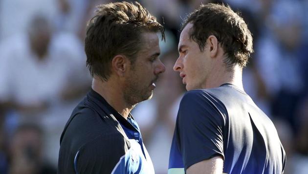 Britain's Andy Murray, right, after defeating Switzerland's Stan Wawrinka on Day 2 of the Nature Valley International at Devonshire Park, Eastbourne, south England, on Monday. (AP) Britain's Andy Murray, right, after defeating Switzerland's Stan Wawrinka on Day 2 of the Nature Valley International at Devonshire Park, Eastbourne, south England, on Monday. (AP)