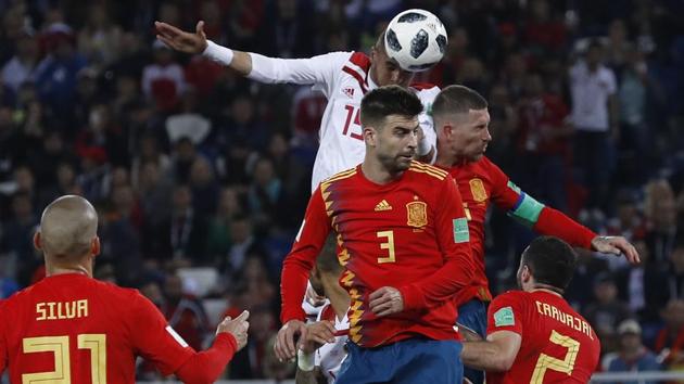 Morocco's Youssef En Nesyri, top, scores his side's second goal during the Group B match vs Spain at the 2018 FIFA World Cup at the Kaliningrad Stadium on Monday.(AP) Morocco's Youssef En Nesyri, top, scores his side's second goal during the Group B match vs Spain at the 2018 FIFA World Cup at the Kaliningrad Stadium on Monday.(AP)