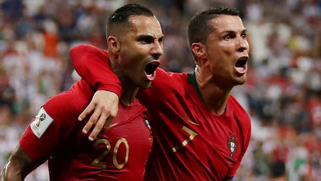Portugal's Ricardo Quaresma celebrates scoring their first goal with Cristiano Ronaldo during their FIFA World Cup Group B match against Iran at the Mordovia Arena in Saransk on Monday.(Reuters)