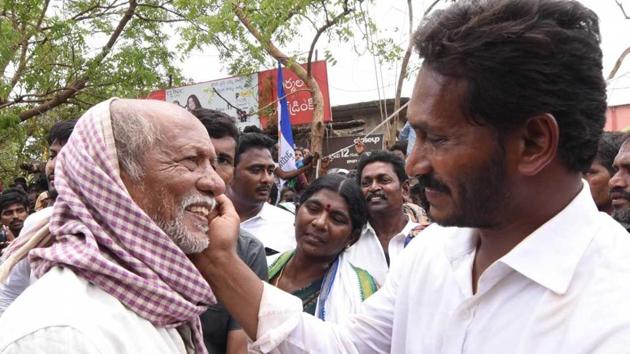 YSR Congress chief YS Jaganmohan Reddy meets people during his padyatra. He has completed 200 days of his marathon foot march intended as political outreach ahead of the elections in Andhra Pradesh.(HT Photo)