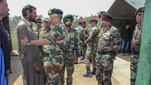 Chief of Army Staff, General Bipin Rawat meets the family members of late rifleman Aurangzeb at his village Salani in Poonch district of Jammu on June 18, 2018. Aurangzeb was abducted and later killed by militants in Gusoo village of south Kashmir’s Pulwama district on June 14.(PTI Photo)