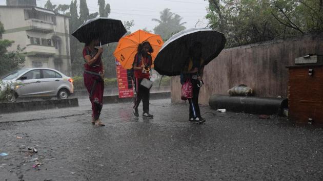 What do most do when it rains? Sleep? Have a hot chai and watch the shower? No, say school children. Be it rain or wind, classes must go on, and students have to endure their teachers while dreaming of the fun they could be having outside on a cold, rainy evening. An evening after school in Kharadi. (HT PHOTO) What do most do when it rains? Sleep? Have a hot chai and watch the shower? No, say school children. Be it rain or wind, classes must go on, and students have to endure their teachers while dreaming of the fun they could be having outside on a cold, rainy evening. An evening after school in Kharadi. (HT PHOTO)