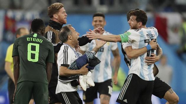 Argentina's Lionel Messi, right, celebrates after the group D match against Nigeria at the FIFA World Cup 2018 in the St. Petersburg.(AP)