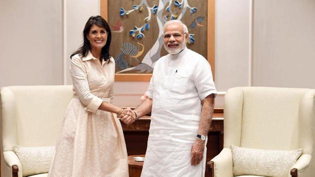 Prime Minister Narendra Modi shakes hands with US Ambassador to the United Nations Nikki Haley before the start of their meeting in New Delhi.(Reuters/PIB)