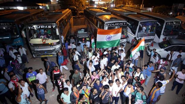 Devotees chant religious slogans as the first batch of pilgrims leave for Amarnath Yatra. Security has been tightened for the visit to the shrine. The Hizbul Mujahideen militant group in Kashmir has apparently said it has no plans to attack the pilgrimage. An audio message believed to be from Hizbul Mujahideen operational commander Riyaz Ahmad Naikoo sought to assure pilgrims that they could go on the yatra even without security cover. (Nitin Kanotra / HT Photo)