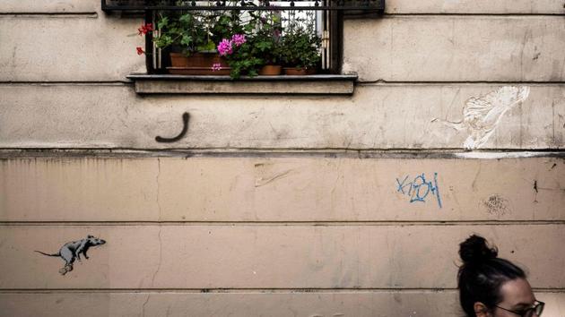The only official link so far from the artist in connection to the stencils has been an Instagram post captioned, “Fifty years since the uprising in Paris 1968. The birthplace of modern stencil art.” (Philippe Lopez / AFP)