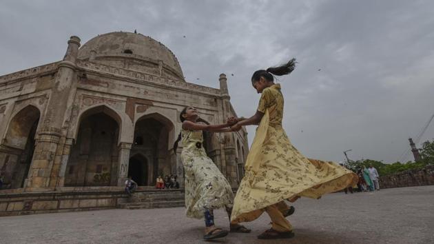 Children play in the compound of Adham Khan’s Tomb in Mehrauli, as dark clouds hover over New Delhi. The normal date for monsoon’s onset in Delhi is June 29. Pre-monsoon thunderstorms and rain have also commenced in most parts of Himachal Pradesh and conditions are favourable for the arrival of southwest monsoon in the state in the next few days. (Burhaan Kinu / HT Photo)