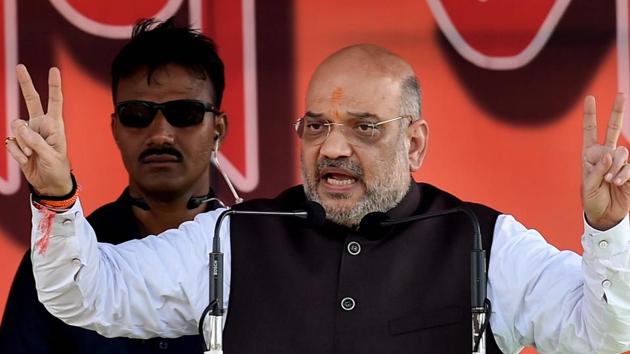 BJP president Amit Shah addresses a public rally in Purulia district of West Bengal. (PTI Photo) BJP president Amit Shah addresses a public rally in Purulia district of West Bengal. (PTI Photo)