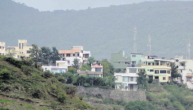 Buildings have been constructed on hilltops of newly included villages within PMC limits. A view of Ambegaon Khurd. (RAVINDRA JOSHI/HT PHOTO) Buildings have been constructed on hilltops of newly included villages within PMC limits. A view of Ambegaon Khurd. (RAVINDRA JOSHI/HT PHOTO)