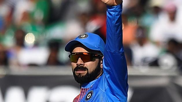 Virat Kohli celebrates victory after the match. (REUTERS)