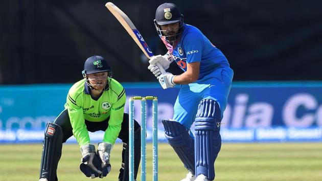 Rohit Sharma in action as Ireland's Stuart Poynter looks on from behind the stumps. (REUTERS)