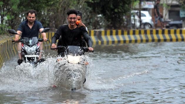 Widespread rains led to a drop in the mercury, bringing cheer to people across the state. (Pardeep Pandit/HT)