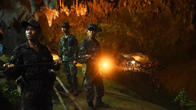 Flood waters seeped into a second chamber of the Tham Luang cave in Chiang Rai province forcing some of the rescue divers to turn back. (AFP) Flood waters seeped into a second chamber of the Tham Luang cave in Chiang Rai province forcing some of the rescue divers to turn back. (AFP)
