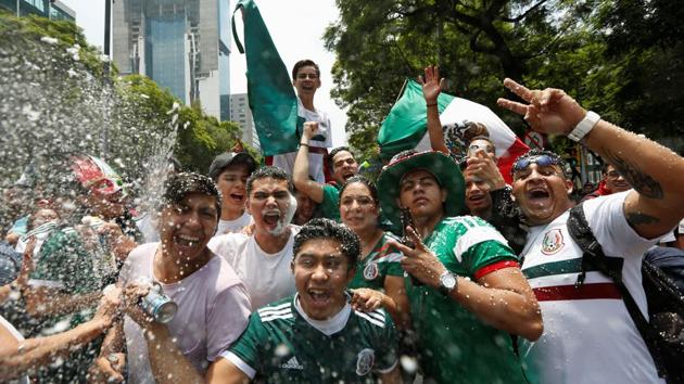 Hundreds of Mexico fans celebrated outside the embassy in the upmarket neighborhood of Lomas de Chapultepec, waving flags of both their country as well as South Korea, donning sombreros and quaffing tequila.(REUTERS)