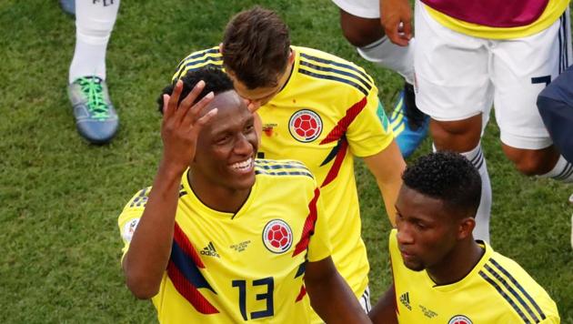 Colombia's Yerry Mina and Jefferson Lerma celebrate their win against Senegal in the FIFA World Cup at the Samara Arena on Thursday.(Reuters)