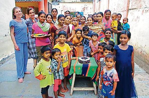 Two-year-old Rishikesh (centre) was born inside the prison, where his mother is lodged. His birthday celebrations were part of the prison’s new approach towards inmates’ children(HT Photo) Two-year-old Rishikesh (centre) was born inside the prison, where his mother is lodged. His birthday celebrations were part of the prison’s new approach towards inmates’ children(HT Photo)