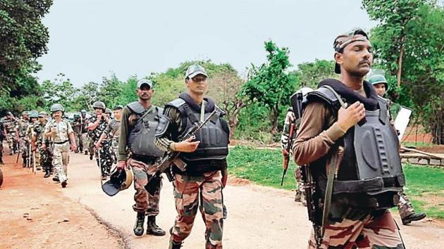 Security personnel deployed to arrest the Khunti gangrape accused patrol in Udbhuru village on June 26. (HT Photo) Security personnel deployed to arrest the Khunti gangrape accused patrol in Udbhuru village on June 26. (HT Photo)
