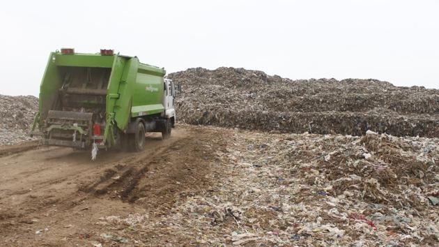 The Bandhwari landfill in Gurugram, India. A 2015 survey by an environment expert found that both surface and groundwater in Bandhwari were highly polluted due to the leachate percolating into the ground. Around 1,20 0 tonnes of waste is dumped at the site daily. (Yogendra Kumar/HT PHOTO) The Bandhwari landfill in Gurugram, India. A 2015 survey by an environment expert found that both surface and groundwater in Bandhwari were highly polluted due to the leachate percolating into the ground. Around 1,20 0 tonnes of waste is dumped at the site daily. (Yogendra Kumar/HT PHOTO)