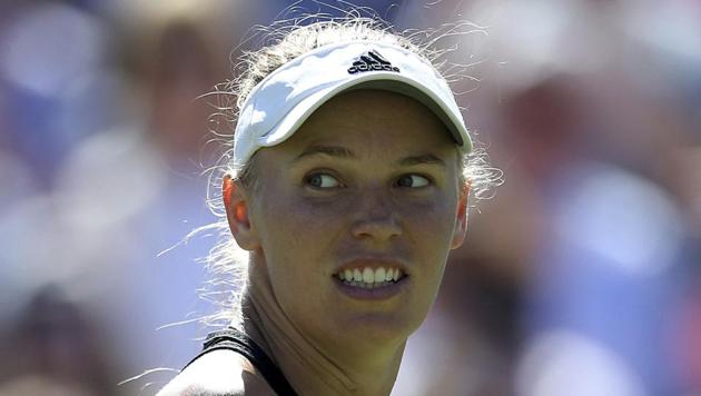 Denmark's Caroline Wozniacki celebrates defeating Germany's Angelique Kerber in their semi-final at the Nature Valley International at Devonshire Park, Eastbourne, south England, on Friday.(AP)