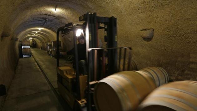 A cellar worker takes barrels into a cave at the Keller Estate winery. Familia Torres president Miguel A. Torres said that winemakers should also try to reduce their greenhouse gas emissions. Wineries are now starting to set up in Brittany, which previously was undesirable because of Atlantic wind, rain and lack of sunshine. These days, vineyards are even planted as far north as Sweden. (Eric Risberg / AP) A cellar worker takes barrels into a cave at the Keller Estate winery. Familia Torres president Miguel A. Torres said that winemakers should also try to reduce their greenhouse gas emissions. Wineries are now starting to set up in Brittany, which previously was undesirable because of Atlantic wind, rain and lack of sunshine. These days, vineyards are even planted as far north as Sweden. (Eric Risberg / AP)