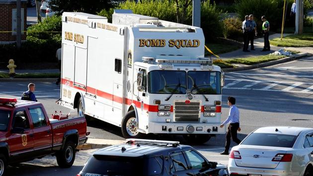 Emergency response vehicles drive near a shooting scene after a gunman opened fire at the Capital Gazette newspaper in Annapolis, Maryland, U.S., June 28, 2018.(REUTERS)